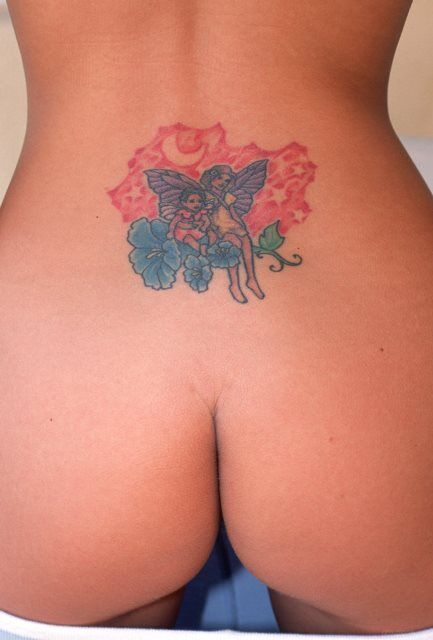 Tattoo above her naked Butt